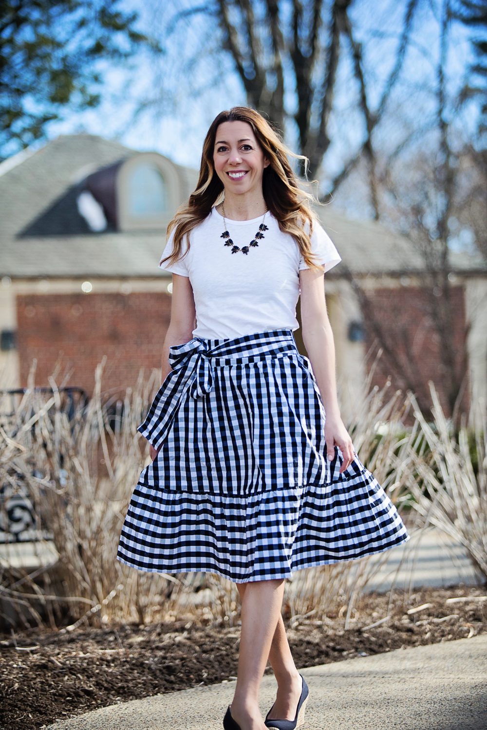The Motherchic wearing gingham skirt from J.Crew Factory