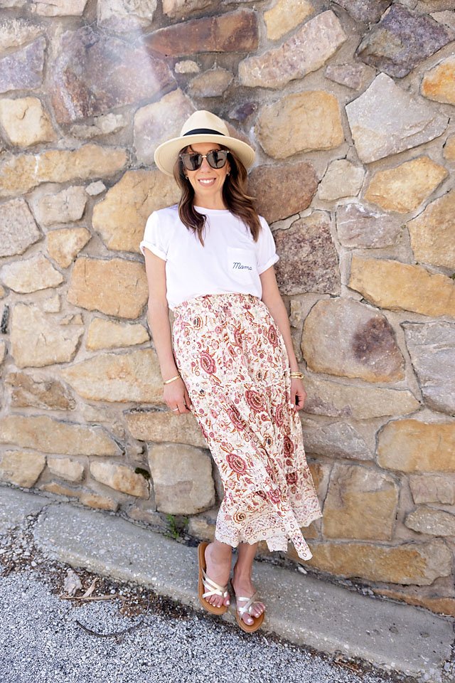 Fully Tucked in a High-Waisted Skirt With Neck Ties Creating Length, 31  Chic Ways to Style and Tuck Your Favourite Shirt This Spring